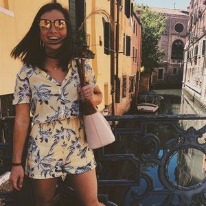 Yellow button up romper